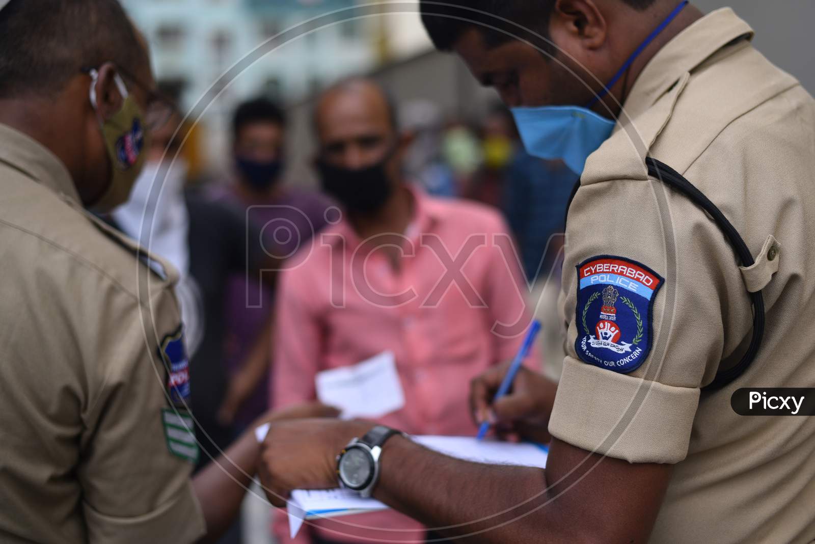 Cyberabad Police register the Migrant Workers from different states so that they can board a Shramik Special Train during an ongoing Nationwide Lockdown amid Coronavirus Pandemic, Kukatpally,Hyderabad, May 19,2020