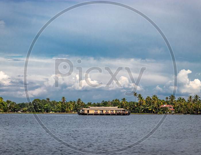 Houseboat With Sky And Palm Tree