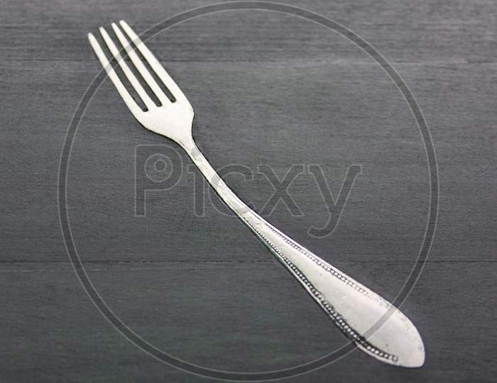 Fork Hammered In Table Design