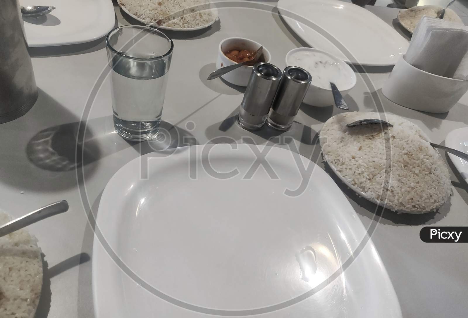 Culinary Set On A Table With Food (Rice And Pickle).