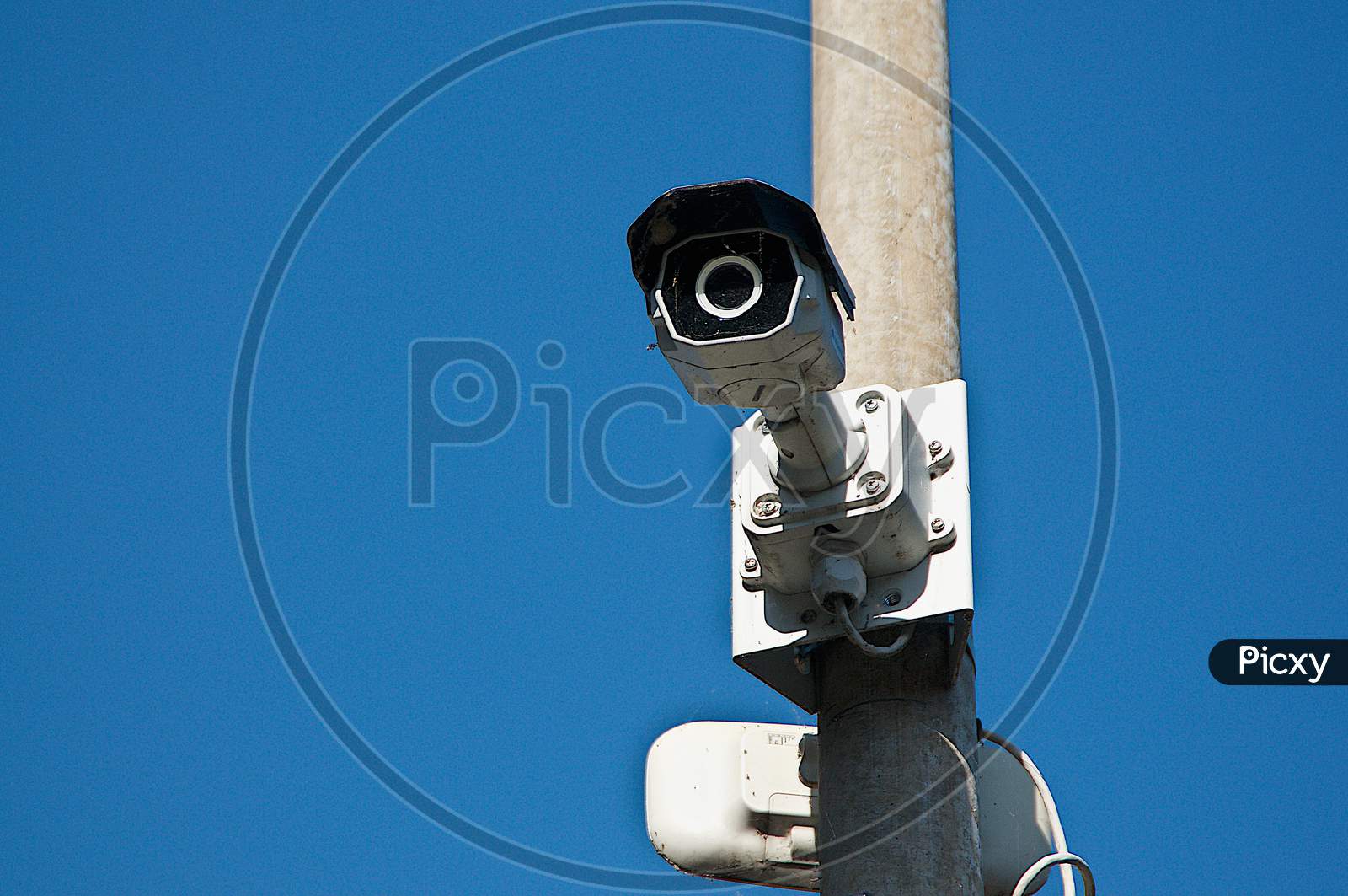Cctv Camera On A Street Light Pole