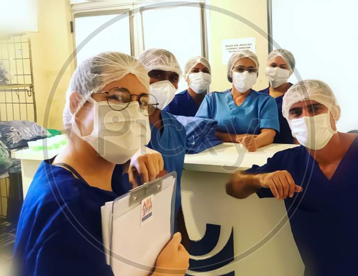 Doctors And Nurses In Covid 19 Hospital Have Shallow Depth Of Field Selective Focus Blur And Wonderland Background In Covid Hospital Wearing Mask Protective Kit Ppe Kit To Protect From Corona Virus.