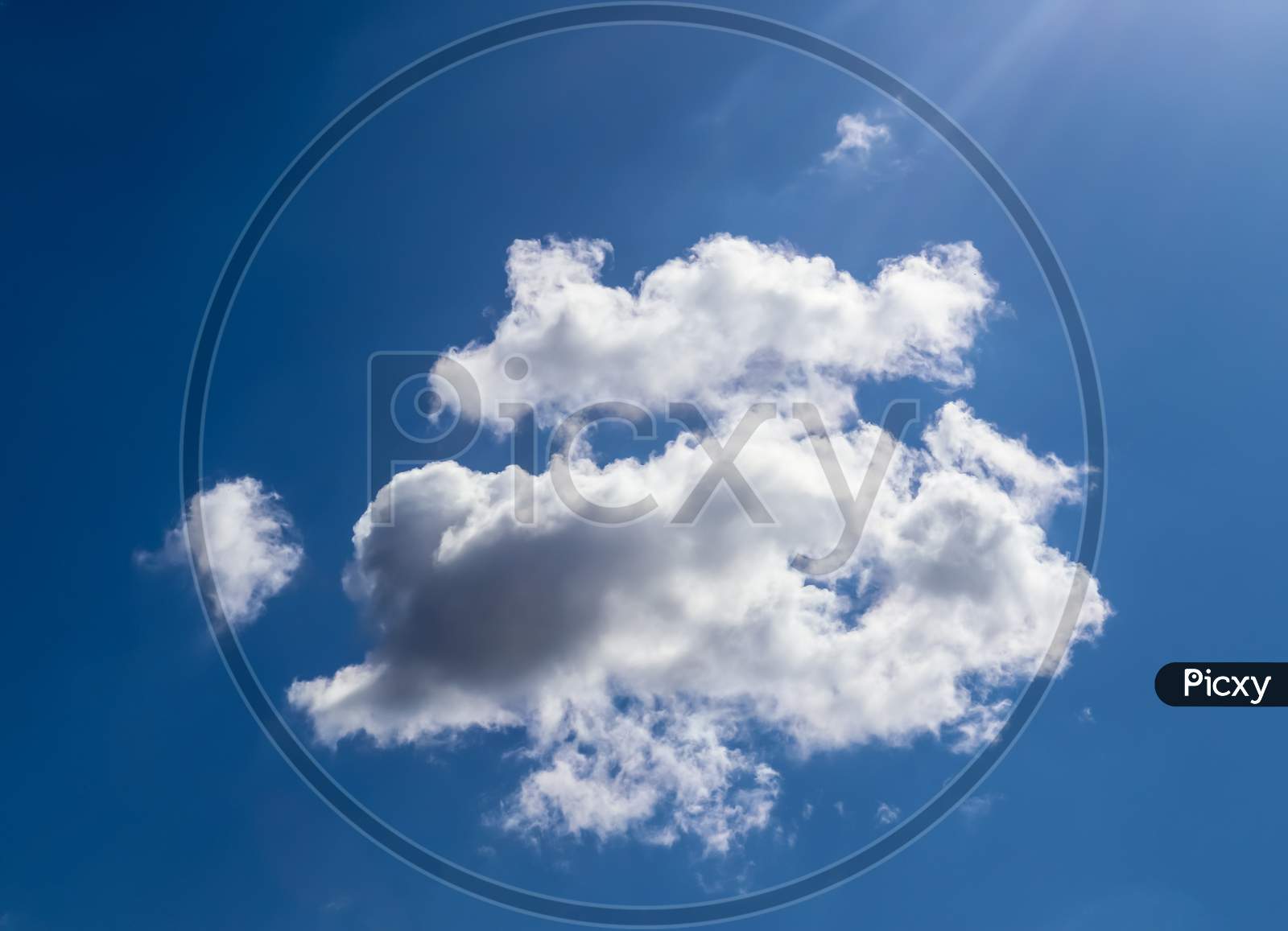 Dramatic Sky With White Cotton Clouds Over Blue Sky As Background