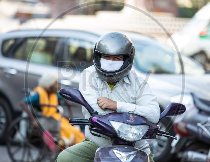 Jodhpur, Rajasthan, India - May 20 2020: Man Wearing Handkerchief Mask To Protect Form Coronavirus Spread,Covid-19 Pandemic In India.