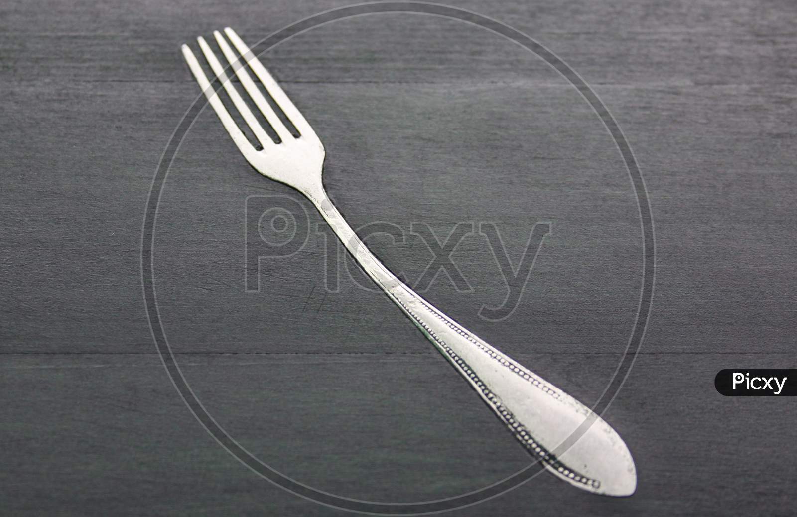 Fork Hammered In Table Design