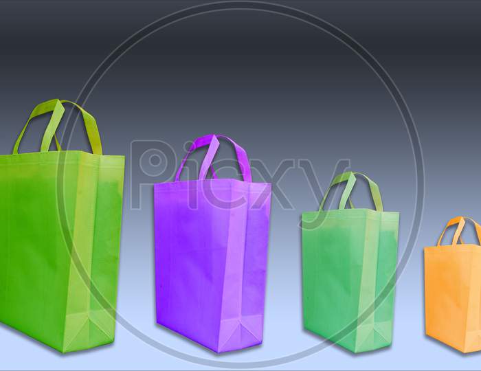 Colorful Non woven Handle loop bags on amazing background