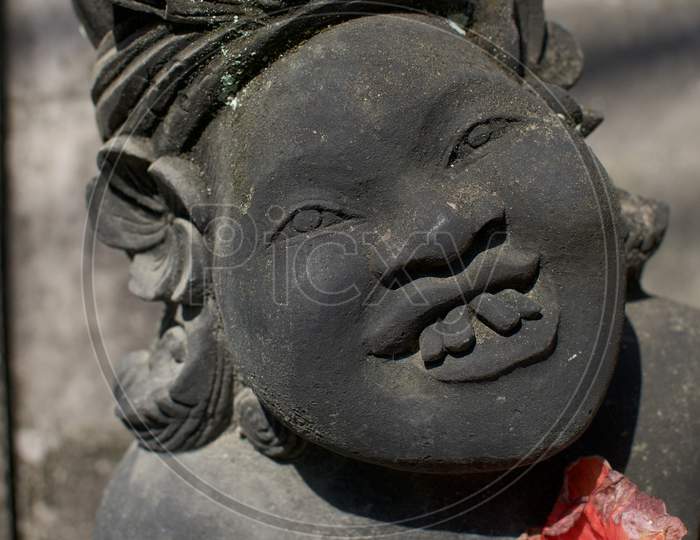 Close Up Of A Bizarre Balinese Stone Statue