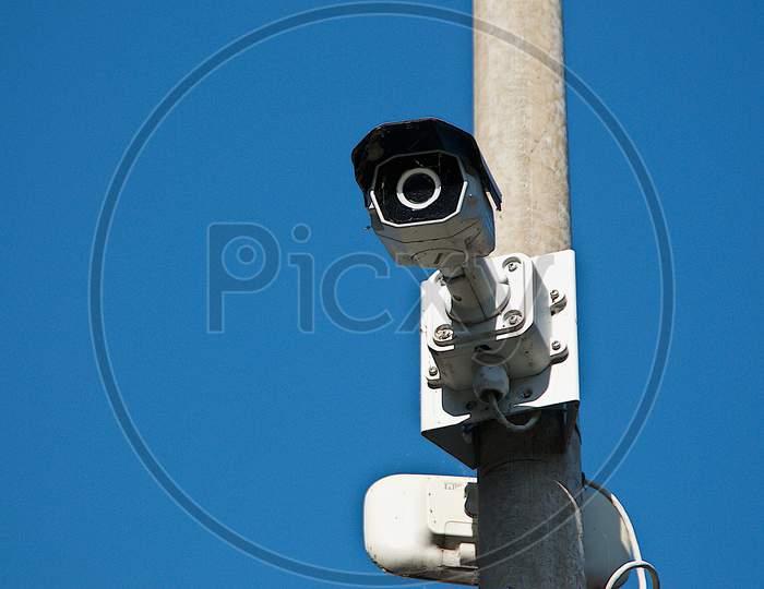Cctv Camera On A Street Light Pole