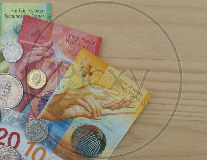 Swiss Banknotes And Coins
