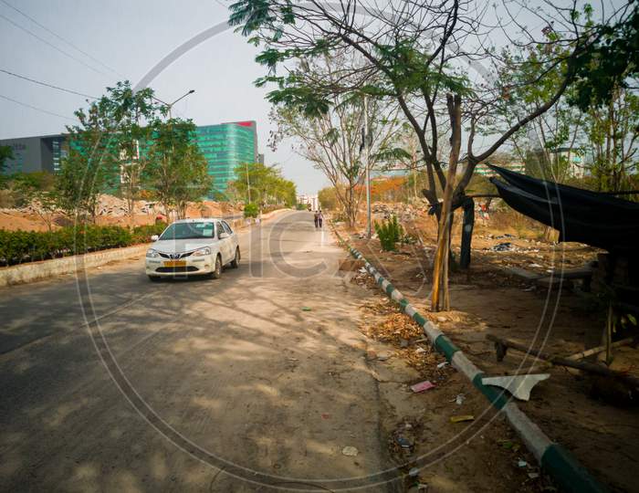 A car is moving in a empty road as cm kcr  extended lockdown in telangana till may 31st due to corona virus pandemic covid 19
