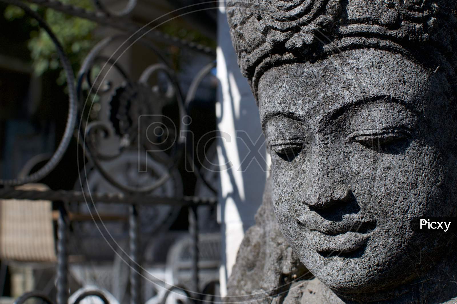 Close Up Picture Of A Stone Buddha Statue