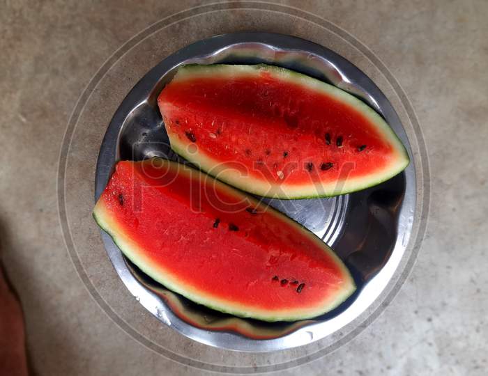 watermelon with slices on white background.