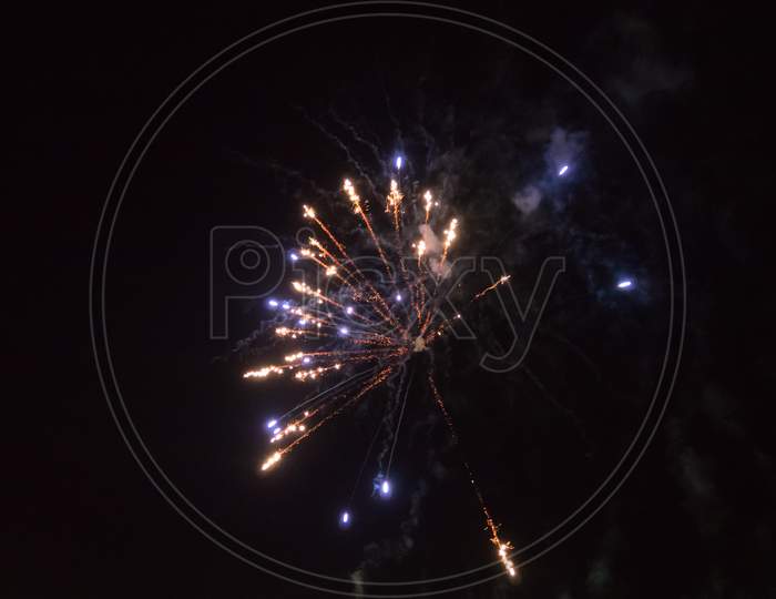 Small, Single, Fireworks In A Black, Night Sky