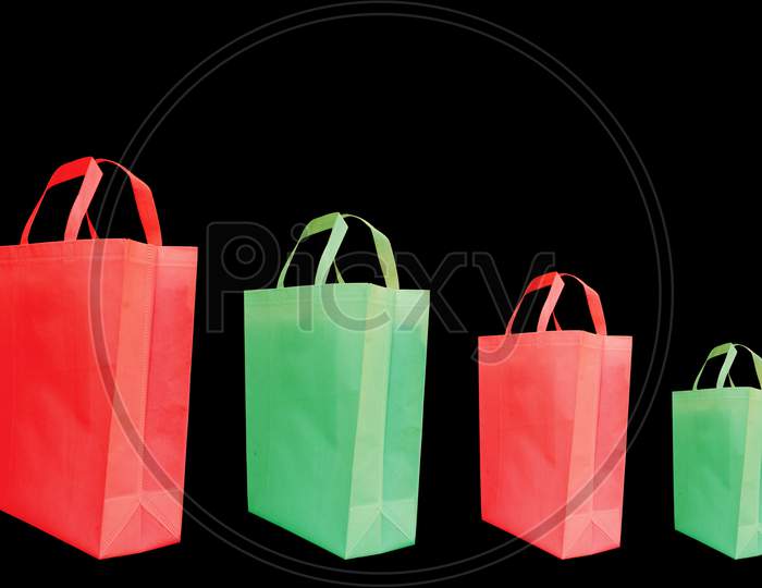 Colorful Non woven bags on black background