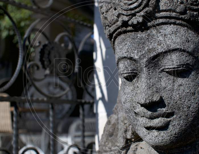 Close Up Picture Of A Stone Buddha Statue