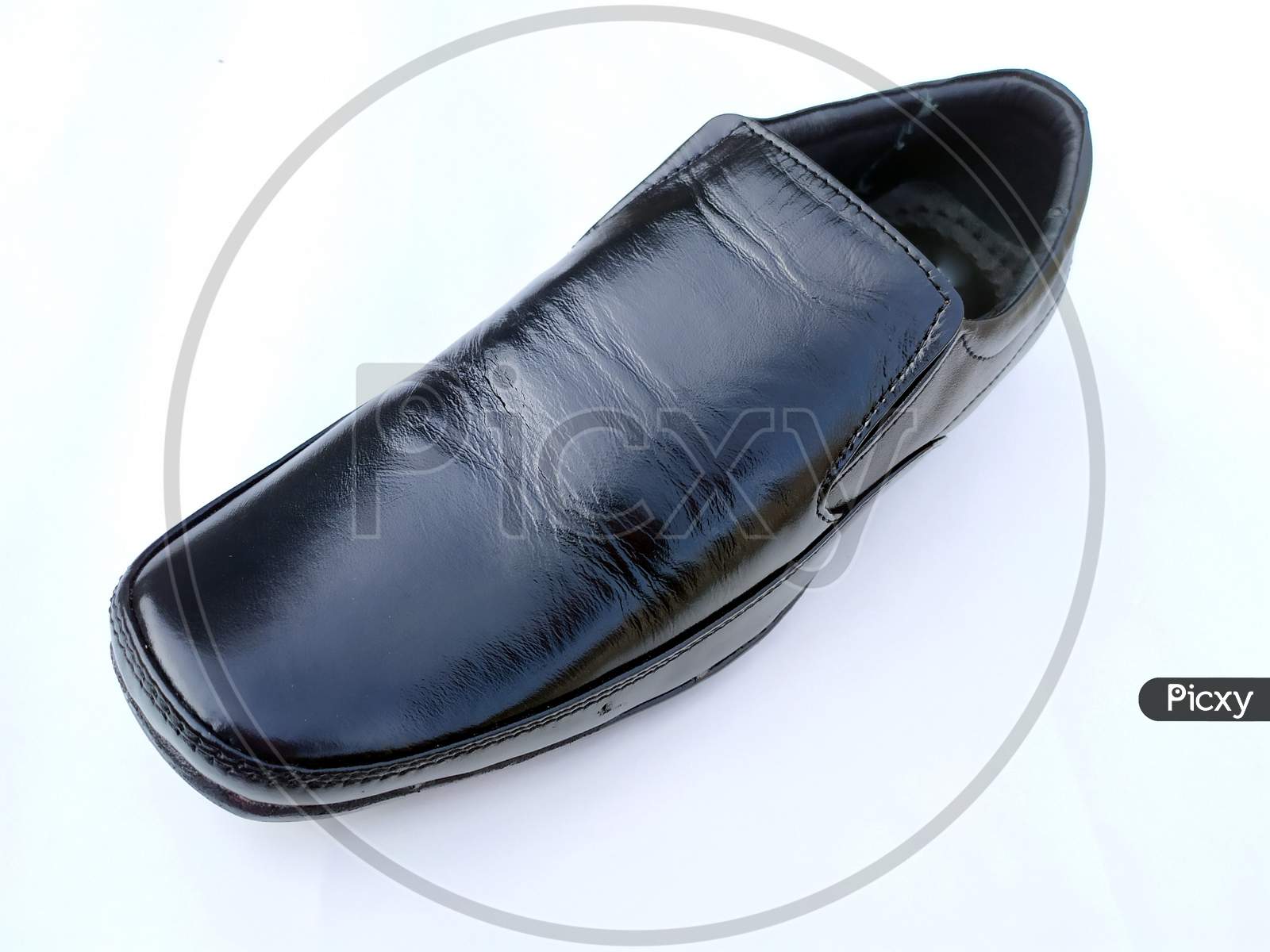 black mans leather shoes isolated on white background
