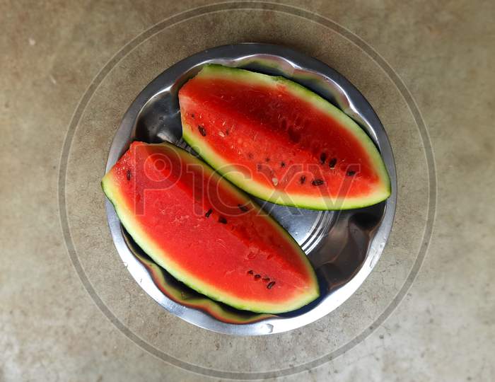 watermelon with slices on white background.