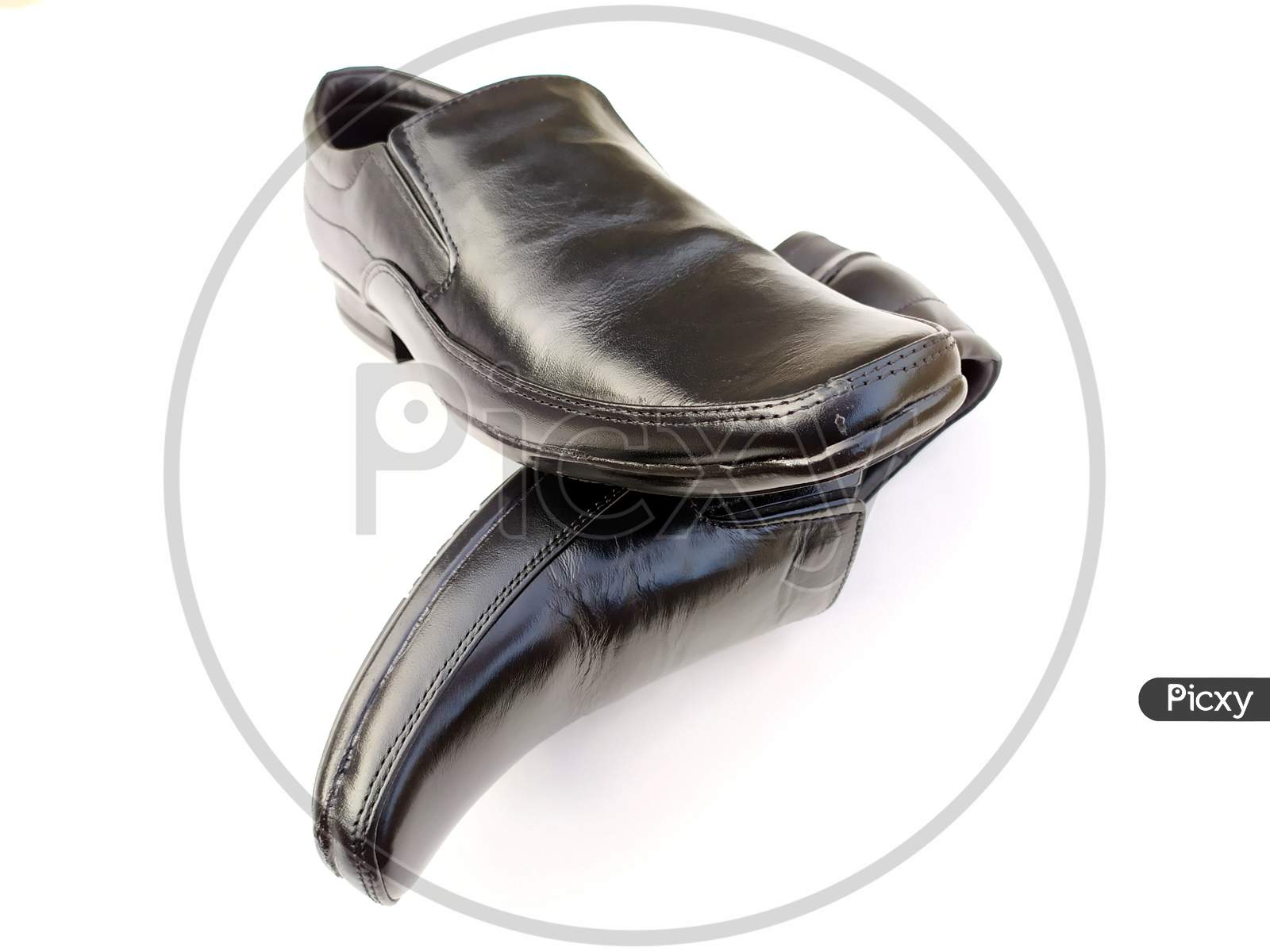 black mans leather shoes isolated on white background