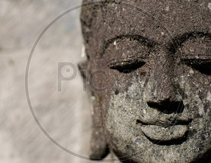Close Up Picture Of A Small Buddha Statue