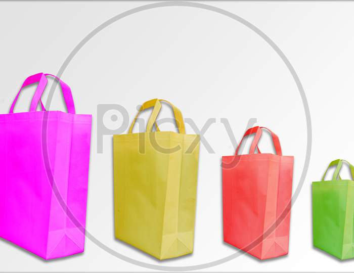 Colorful Non woven Handle loop bags on white background