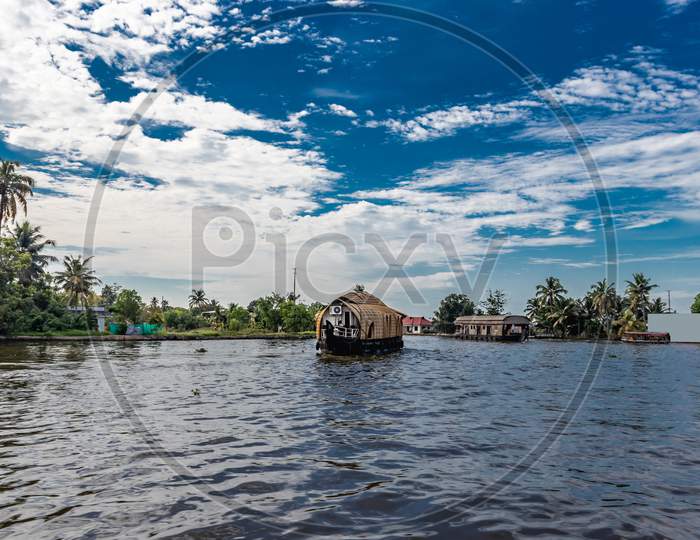 Houseboat In Blue Sky Of Backwater