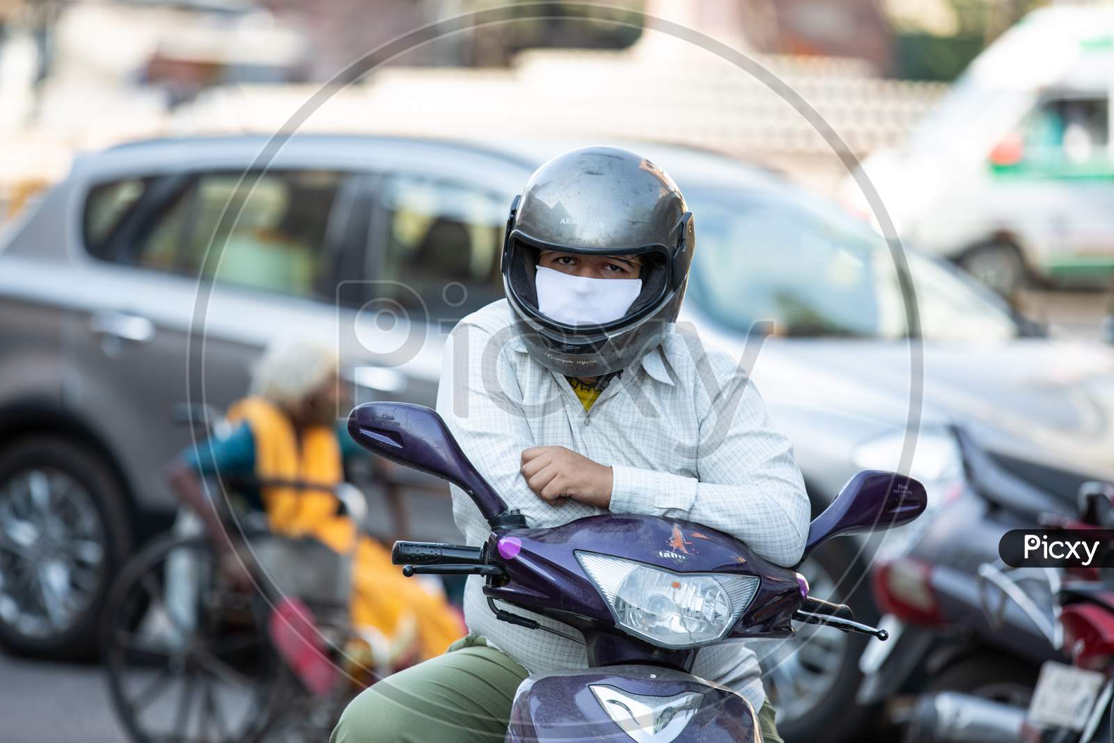 Jodhpur, Rajasthan, India - May 20 2020: Man Wearing Handkerchief Mask To Protect Form Coronavirus Spread,Covid-19 Pandemic In India.