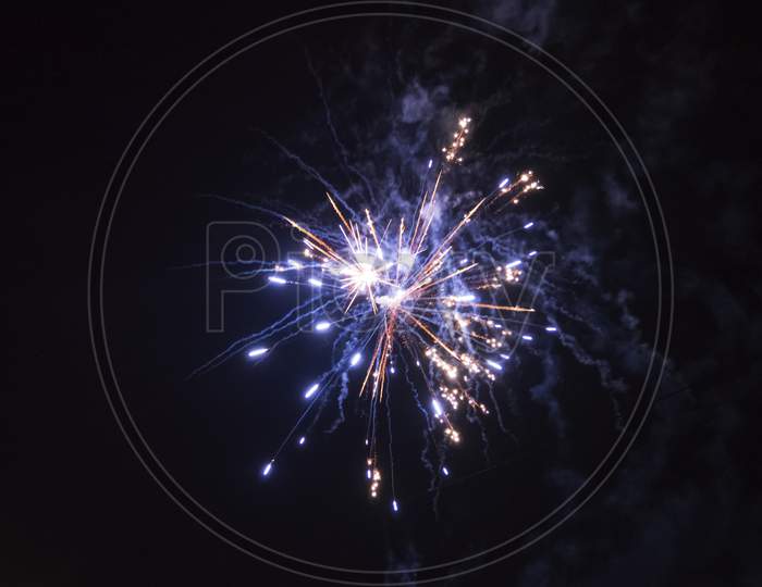 Small, Single, Fireworks In A Black, Night Sky