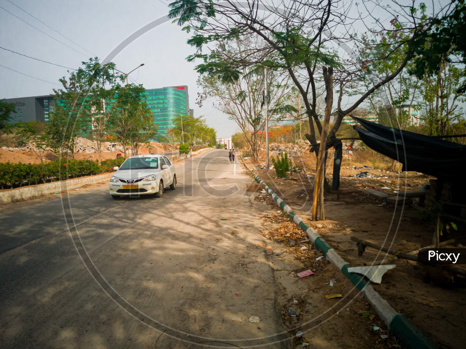 A car is moving in a empty road as cm kcr  extended lockdown in telangana till may 31st due to corona virus pandemic covid 19