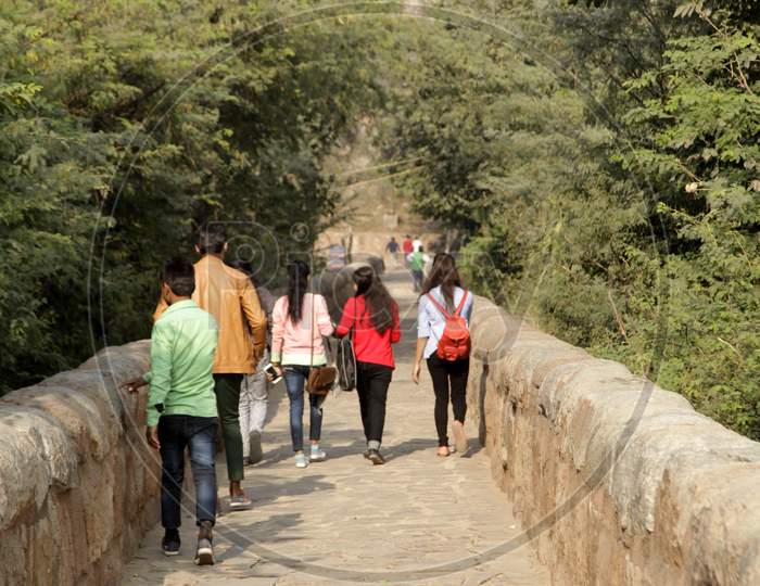 People exploring Tughlakabad Fort in New Delhi