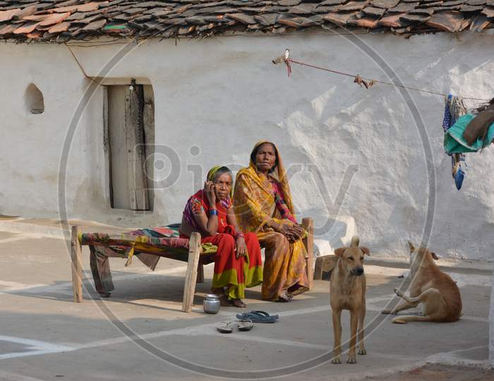 TIKAMGARH, MADHYA PRADESH, INDIA - NOVEMBER 15, 2019: Portrait of unidentified Indian women talking on mobile at her village.