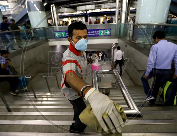 Delhi Metro Started Sanitation Drive As A Preventive Measure Against The Covid-19 Novel Coronavirus Walks Out Of A Metro Station In New Delhi On March 13, 2020.