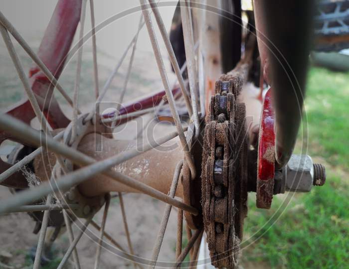 Closeup Of Dusty Chain And Excel Of A Bike Or Bicycle