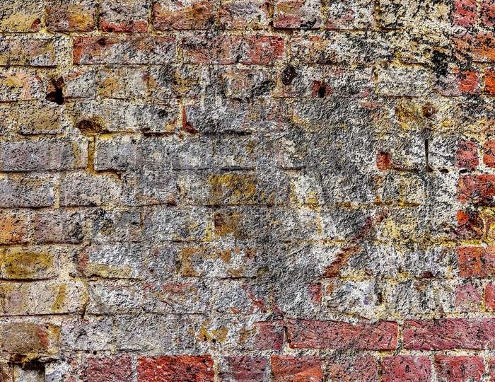 Detailed close up view on aged and weathered brick walls at ruin buildings