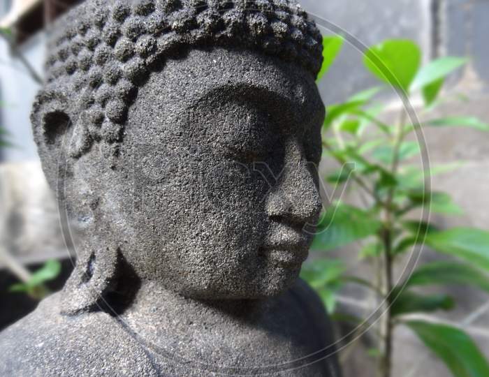 Close Up Of A Small Buddha Statue