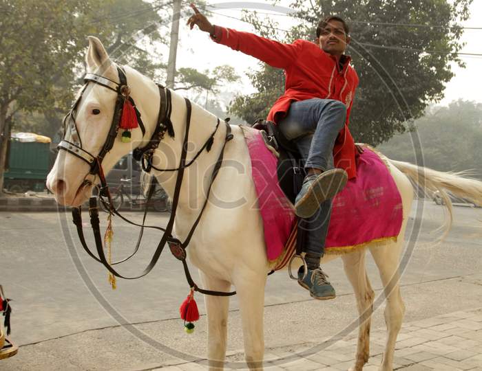 A Local Person On A Horse