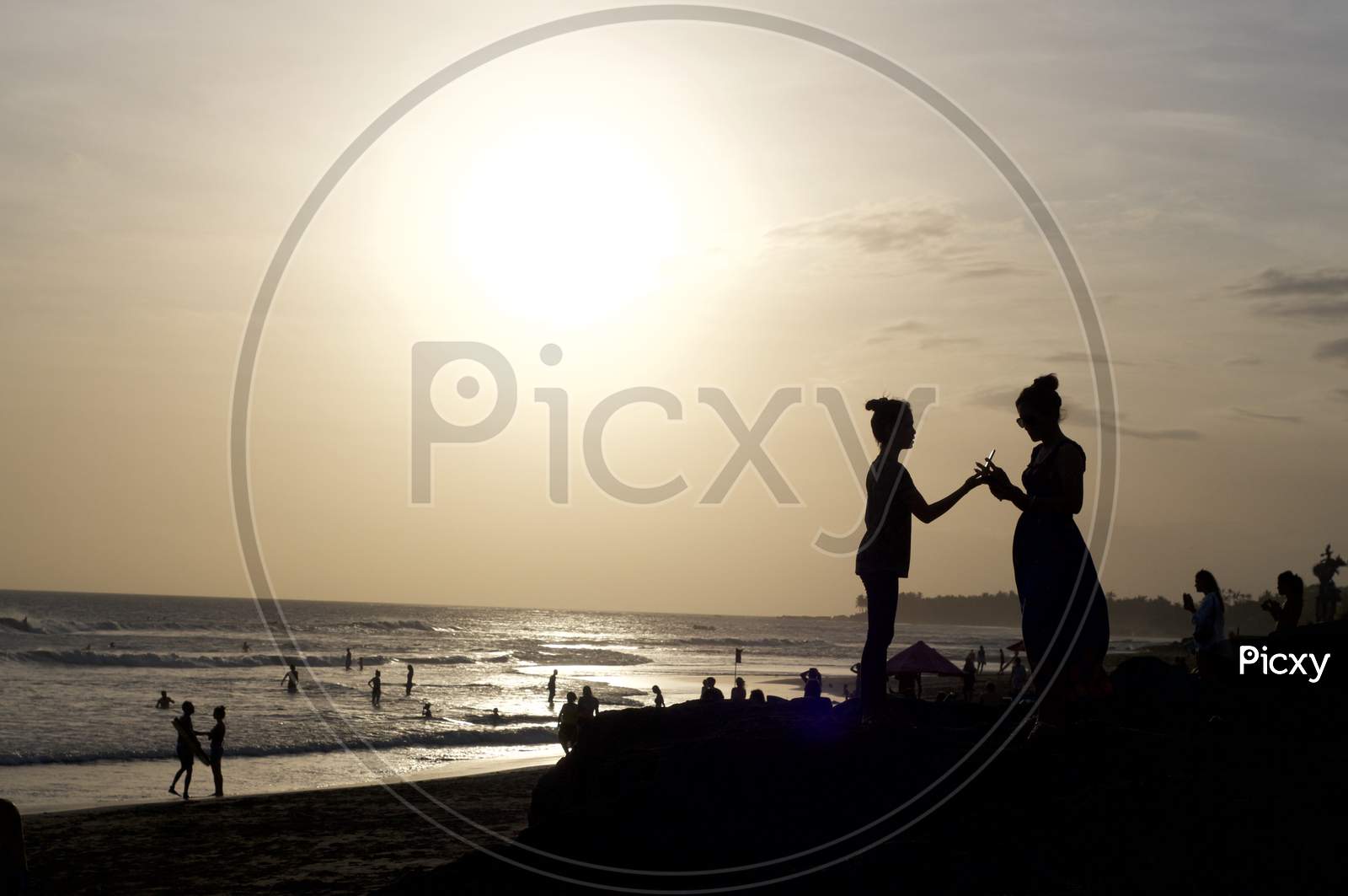 Silhouette Picture Of People At Echo Beach In Canggu