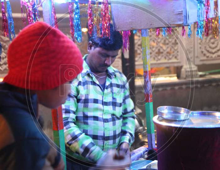 A Person at Golgappa stall