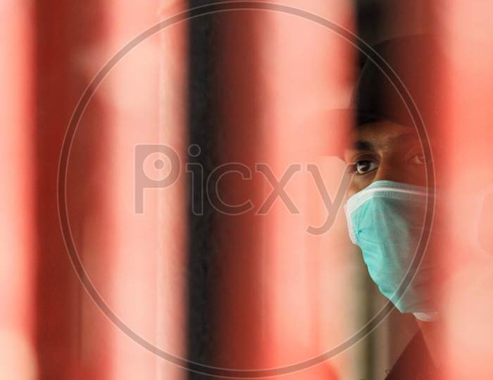 A security guard is seen wearing a protective mask inside a hospital premise where a special ward has been set up for the coronavirus disease in Mumbai, India on March 5, 2020.