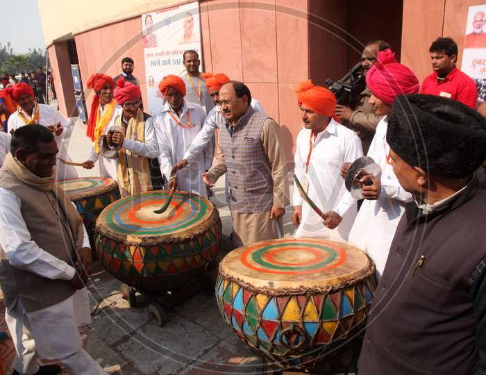 Group of People playing Dhol Paan