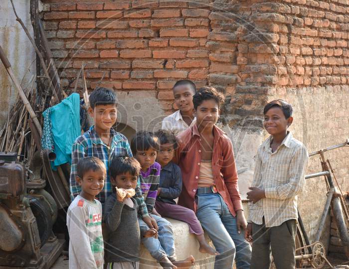 TIKAMGARH, MADHYA PRADESH, INDIA - NOVEMBER 15, 2019: Smiling faces, group of children smiling and having fun and looking at the camera.