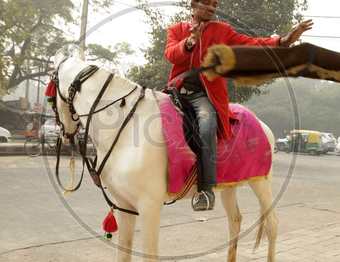 A Local Person On A Horse