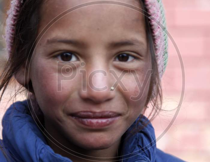Portrait of an Indian Kid with a smiling face