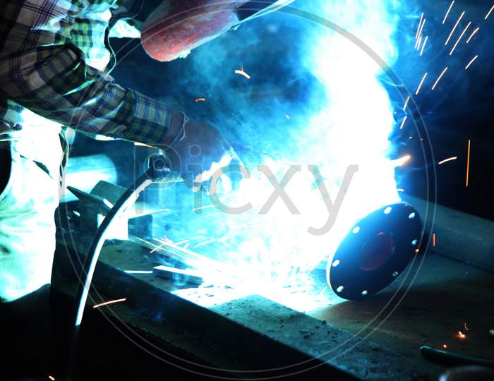 Close up shot of a Person doing Welding