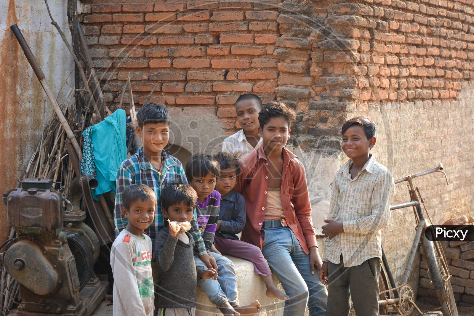 TIKAMGARH, MADHYA PRADESH, INDIA - NOVEMBER 15, 2019: Smiling faces, group of children smiling and having fun and looking at the camera.