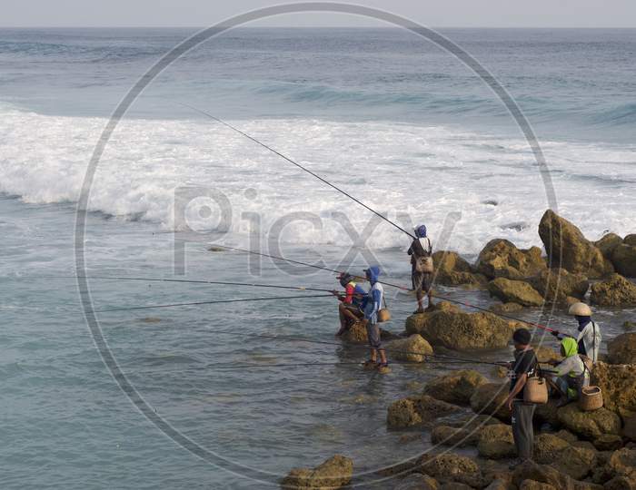 Typical Balinese Fishermen At Melasti Beach