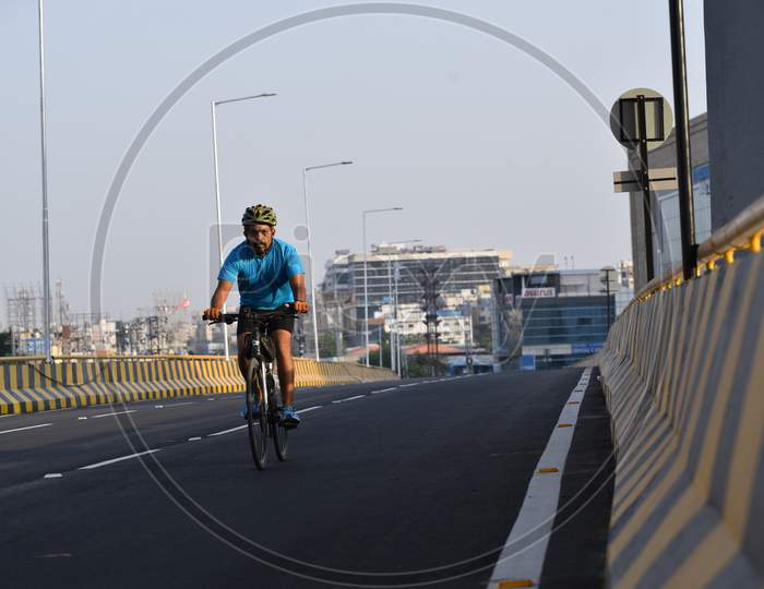 a man seen cycling on the flyover