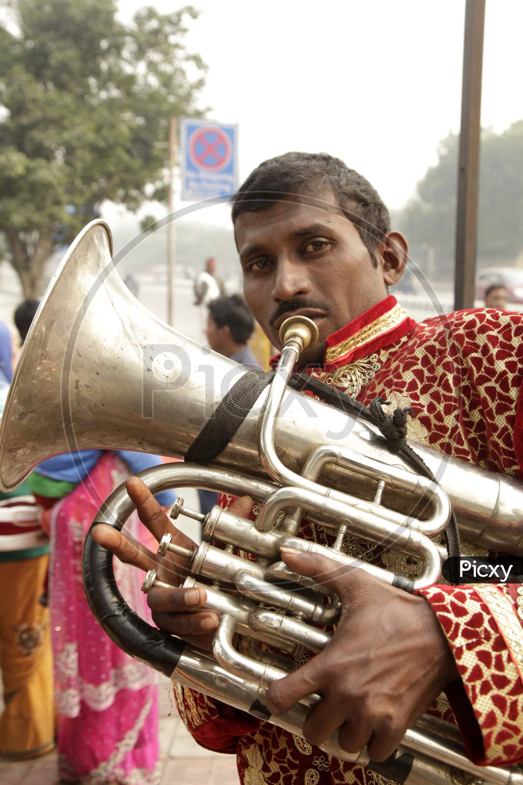 Portrait of a Music Band Person playing the trumpet