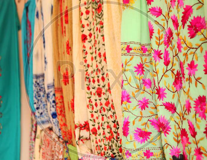 Selective Focus on Hanging Colourful Sarees