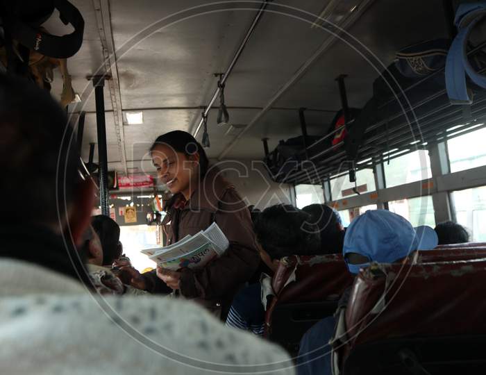 People travelling in a Passenger Bus