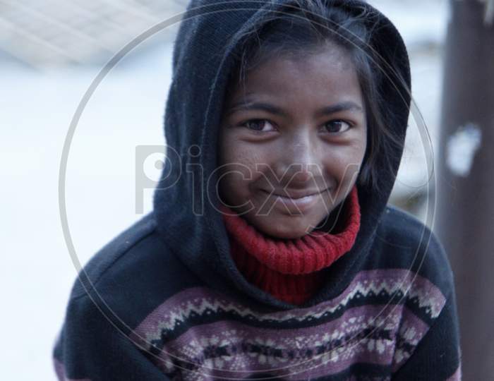 Portrait of an Indian Kid with a smiling face